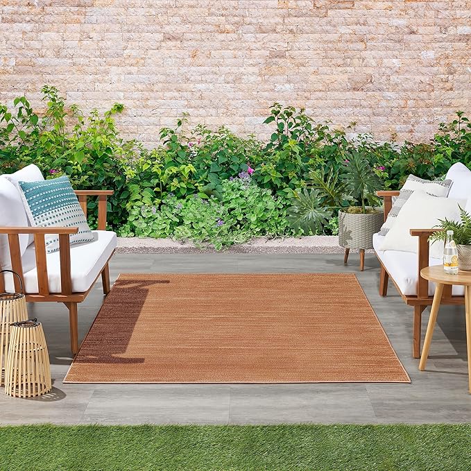 Nourison Essentials 5' x 7' Rust Fabric Area Rug